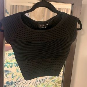 Essential Black top. BEBE crop top. Nice fitted material for a night out. NWT.